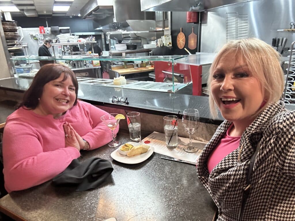 Kelly Fischer and Kelsey Smith at M'Osteria restaurant in Toledo, Ohio.